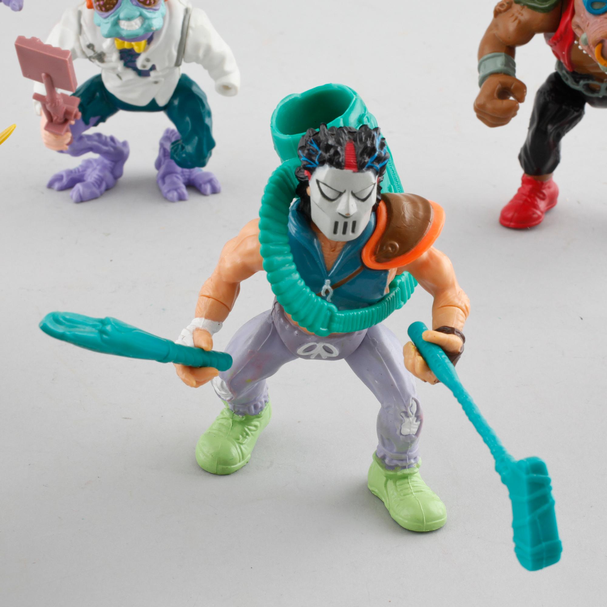 16 Teenage Mutant Ninja Turtles toys from Playmates toys, 1980s and 1990s.