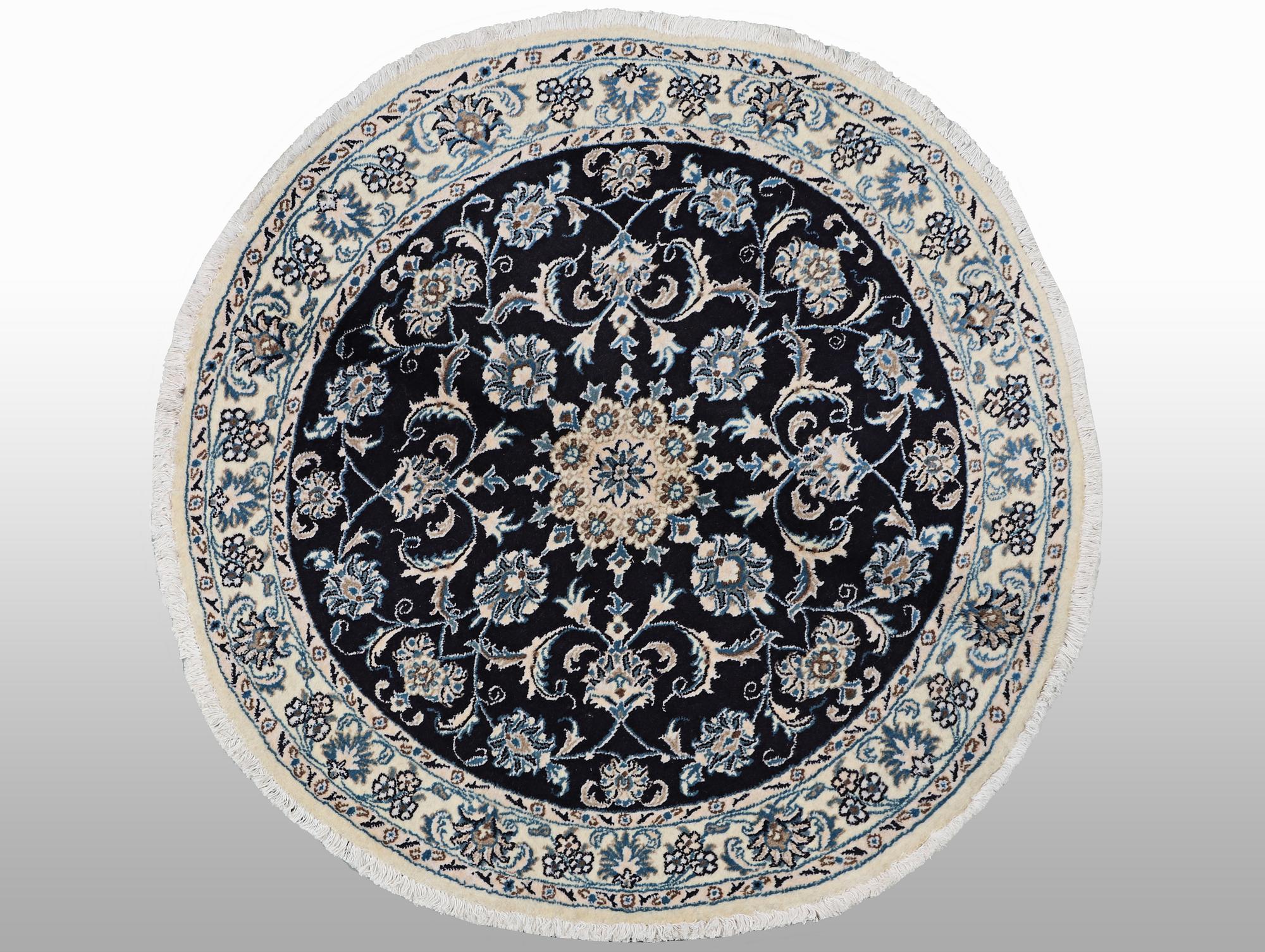 A rug, Nain, part silk, ca 140 x 140 cm.