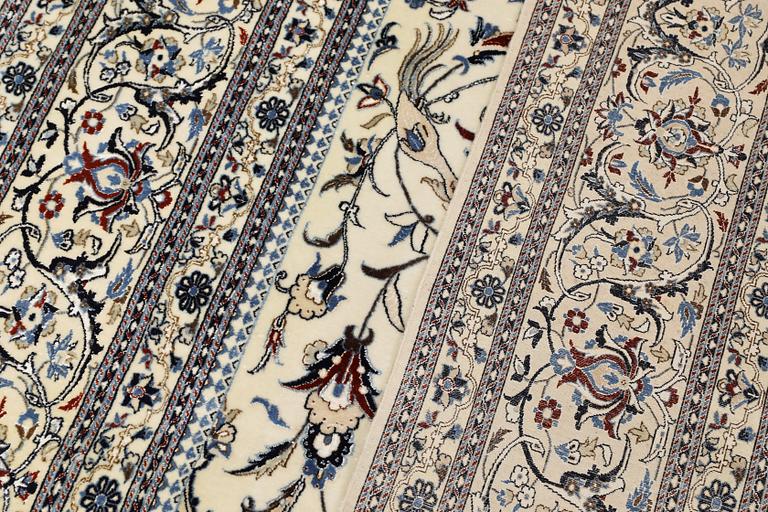 A part silk Nain carpet, so-called 6LAA, approx. 324 x 218 cm.