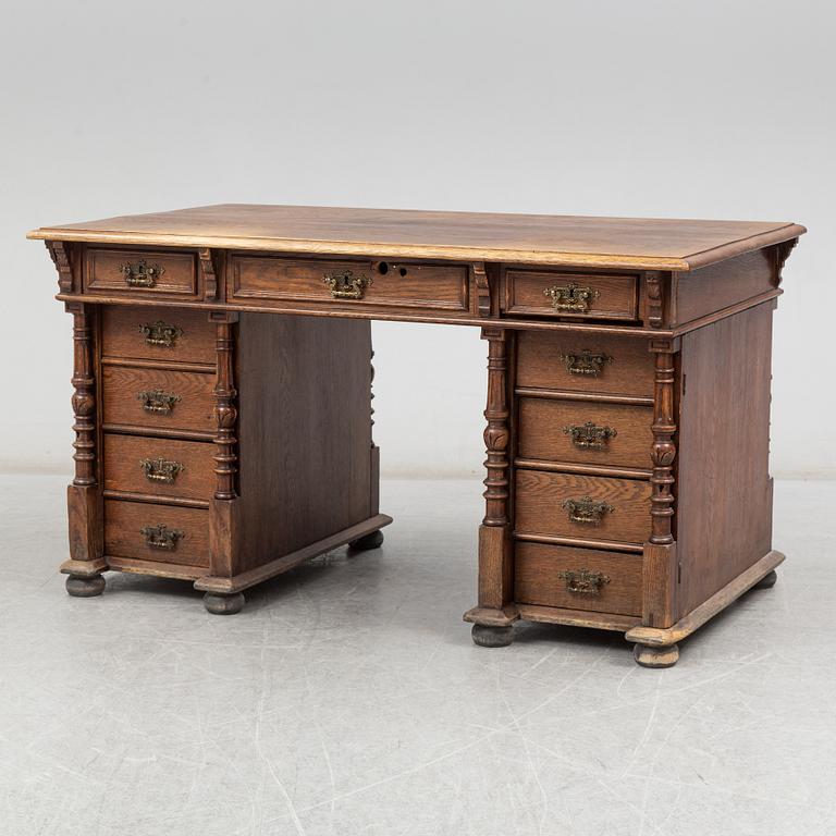 A ca 1900 oak and pine writing desk.