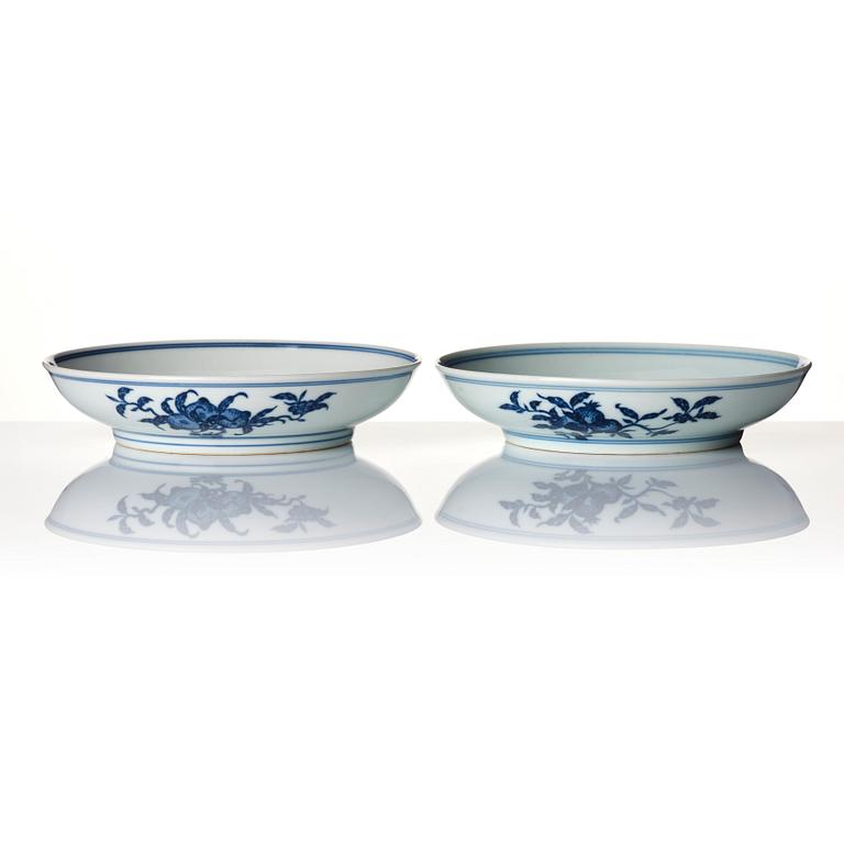 A pair of blue and white nine peaches dishes, presumably Republic, with Yongzheng mark.