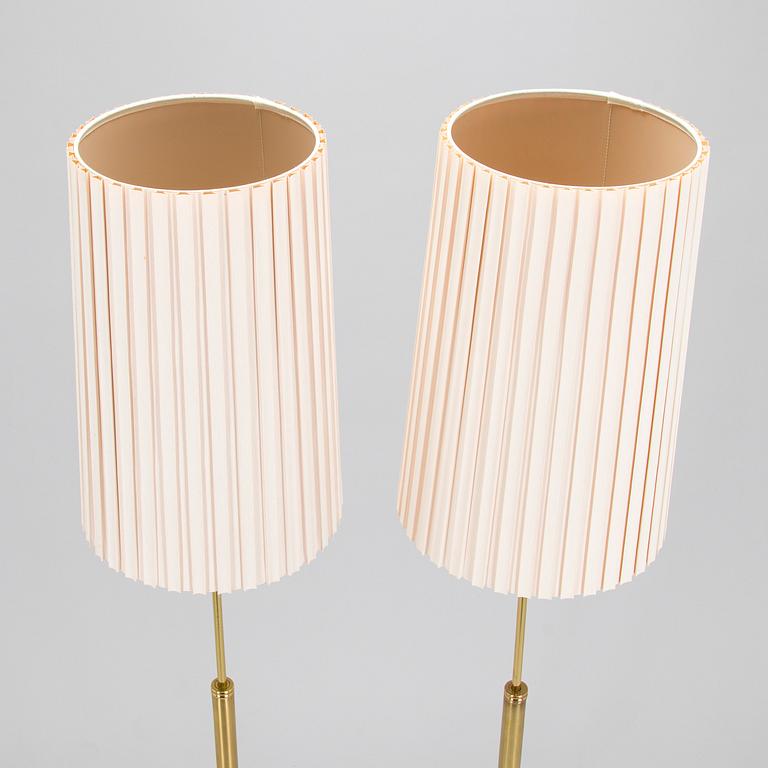 A pair of late 20th century floor lamps.