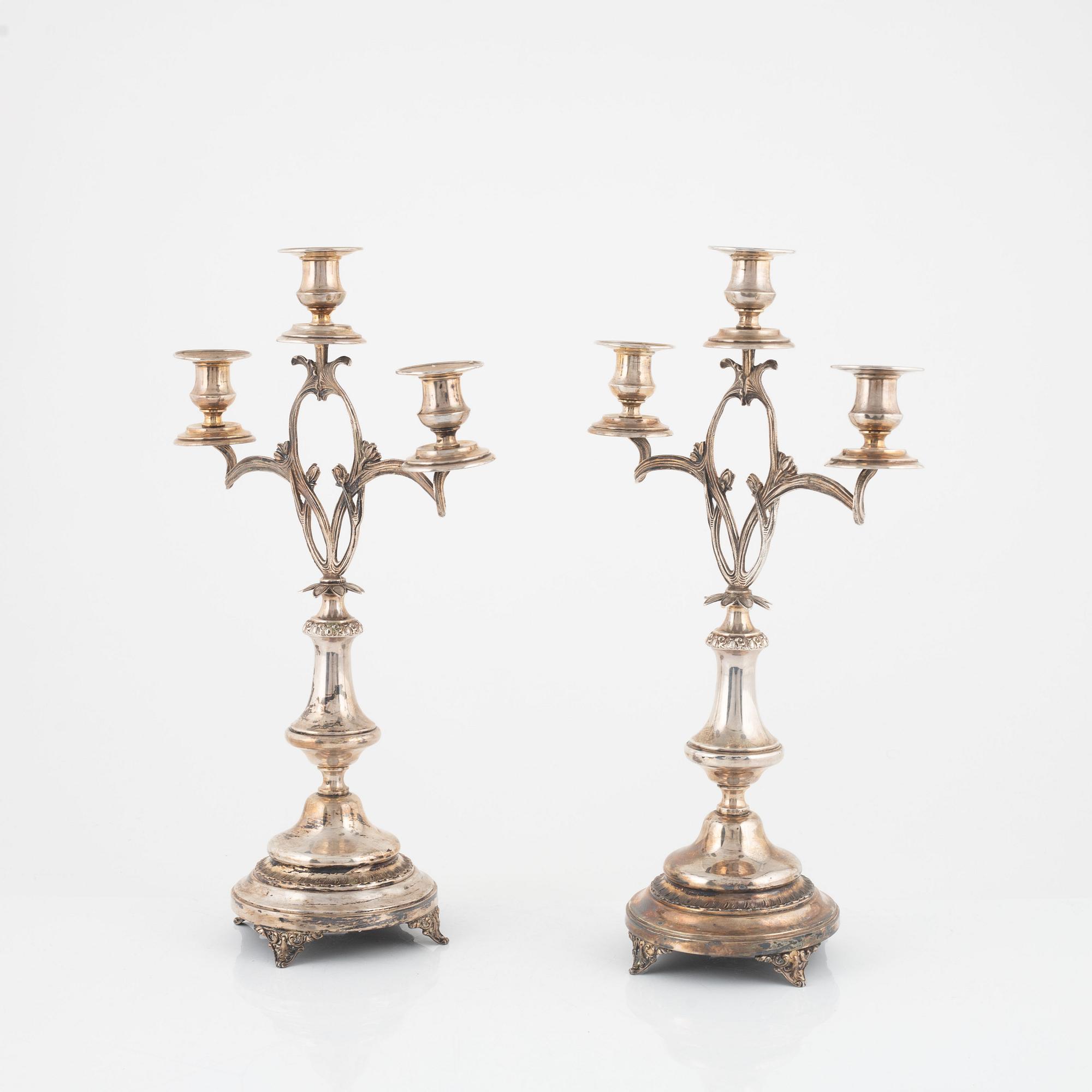 A pair of Art Nouveau silver plated candelabras, early 20th Century.