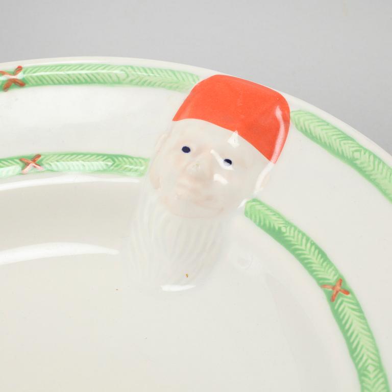 A 20th century set of earthenware tableware of 21 pcs by Gustavsberg.