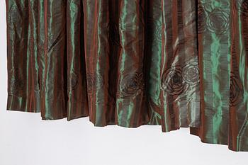 A set of four green silk curtains.