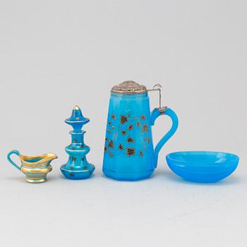 A silver gilt turkoise glass tankard, bottle with stopper, bowl and a small creamer, 19th Century.