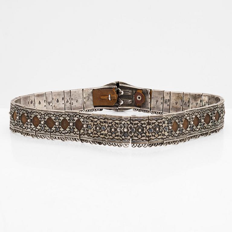 A Caucasian silver and leather belt with niello, early 20th century.