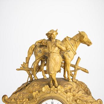 A late 19th century gilded table clock.