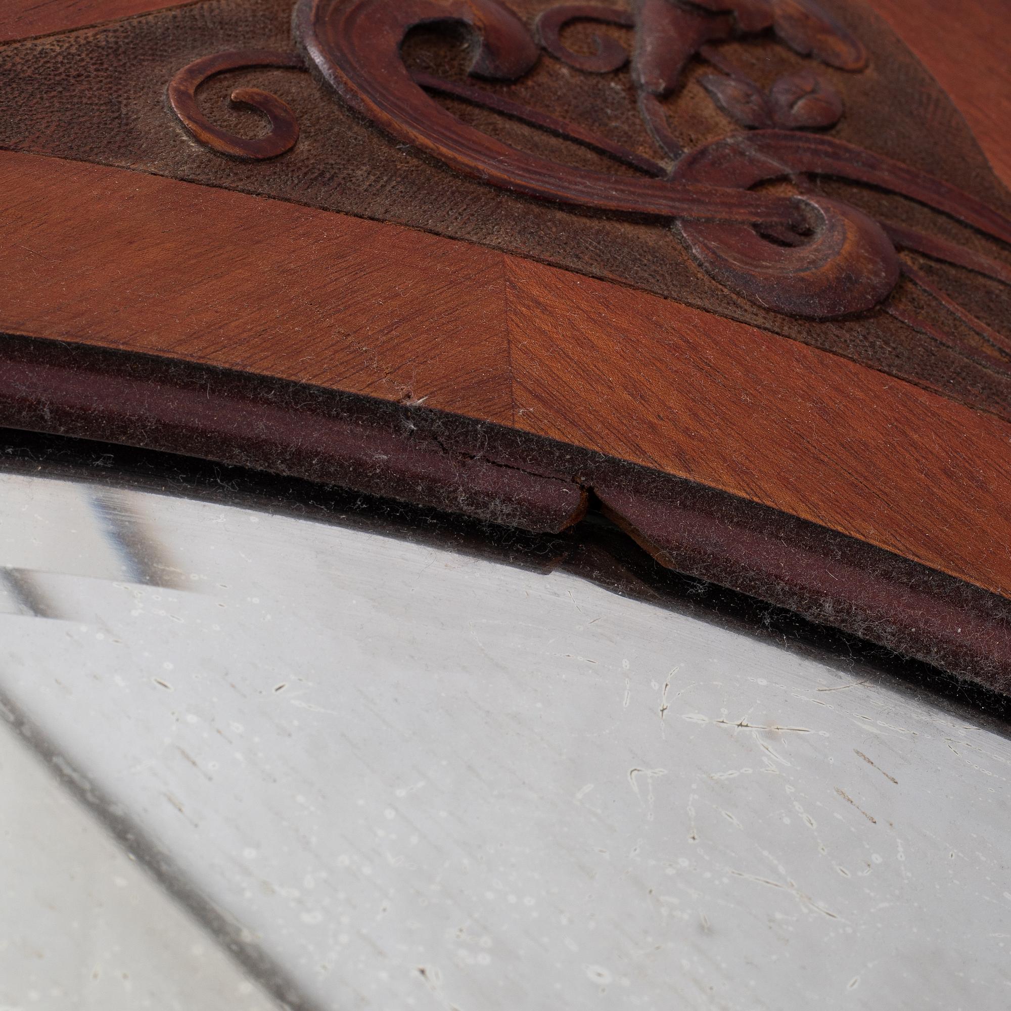 A mahogany Art Nouveau mirror, early 20th century.