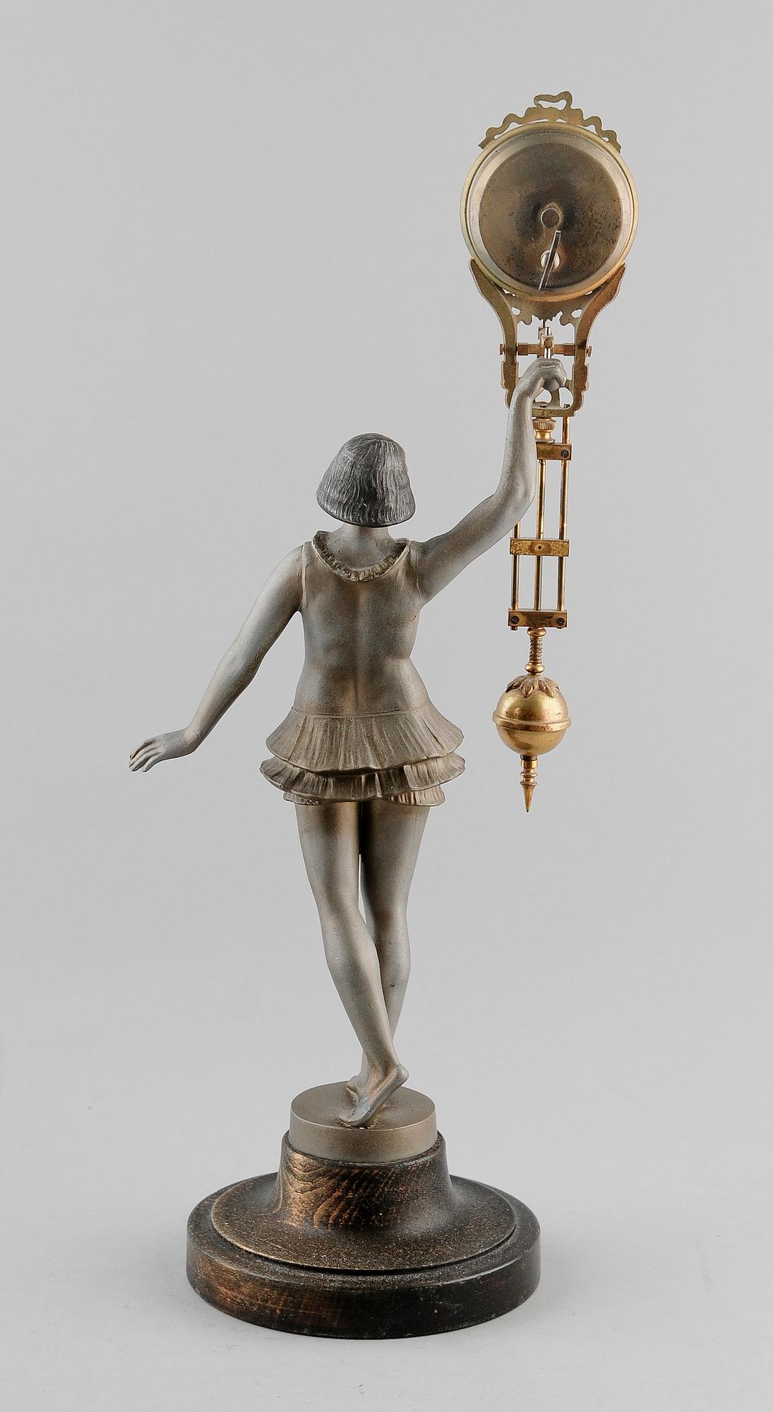BORDSPENDYL, bronserad metall, 1900-talets första hälft.