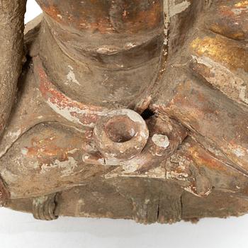A Southeast Asian figure of a Buddha, 20th century.