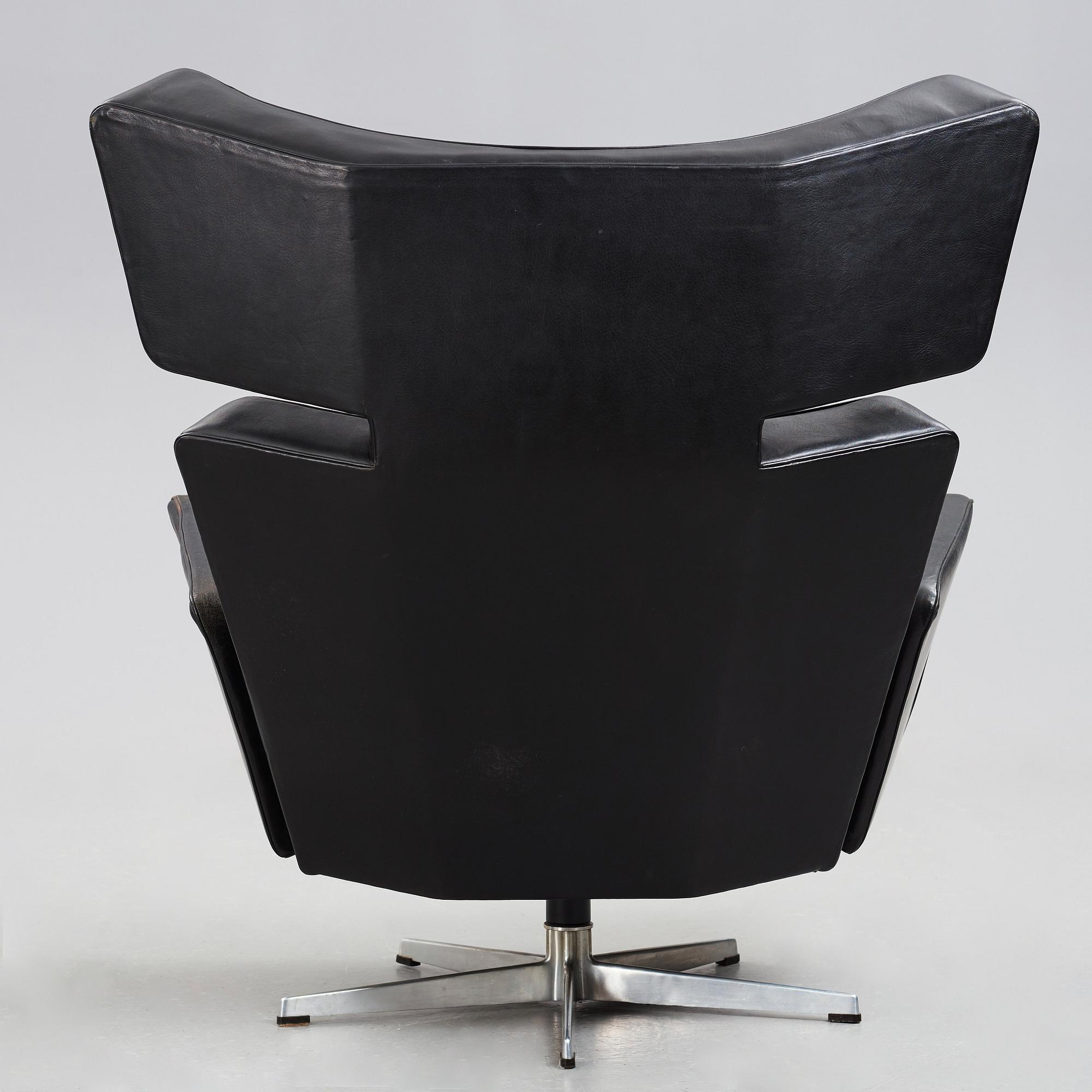 Arne Jacobsen, a black leather and aluminium "Ox-Chair", Denmark 1966.
