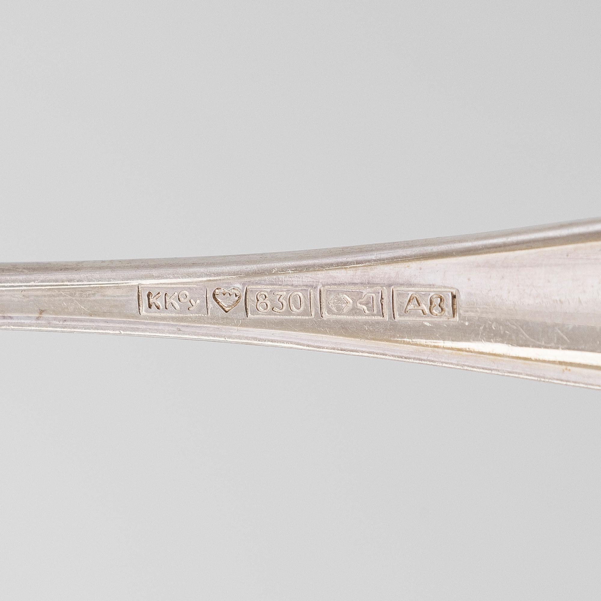 An 56-piece set of 'Chippendale' silver cutlery, Finnish hallmarks.