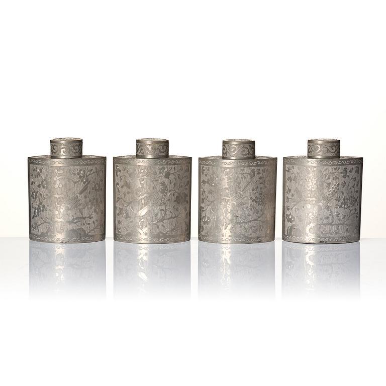 A Chinese lacquer box with a set of five pewter tea caddies, Qing dynasty, 18/19th Century.