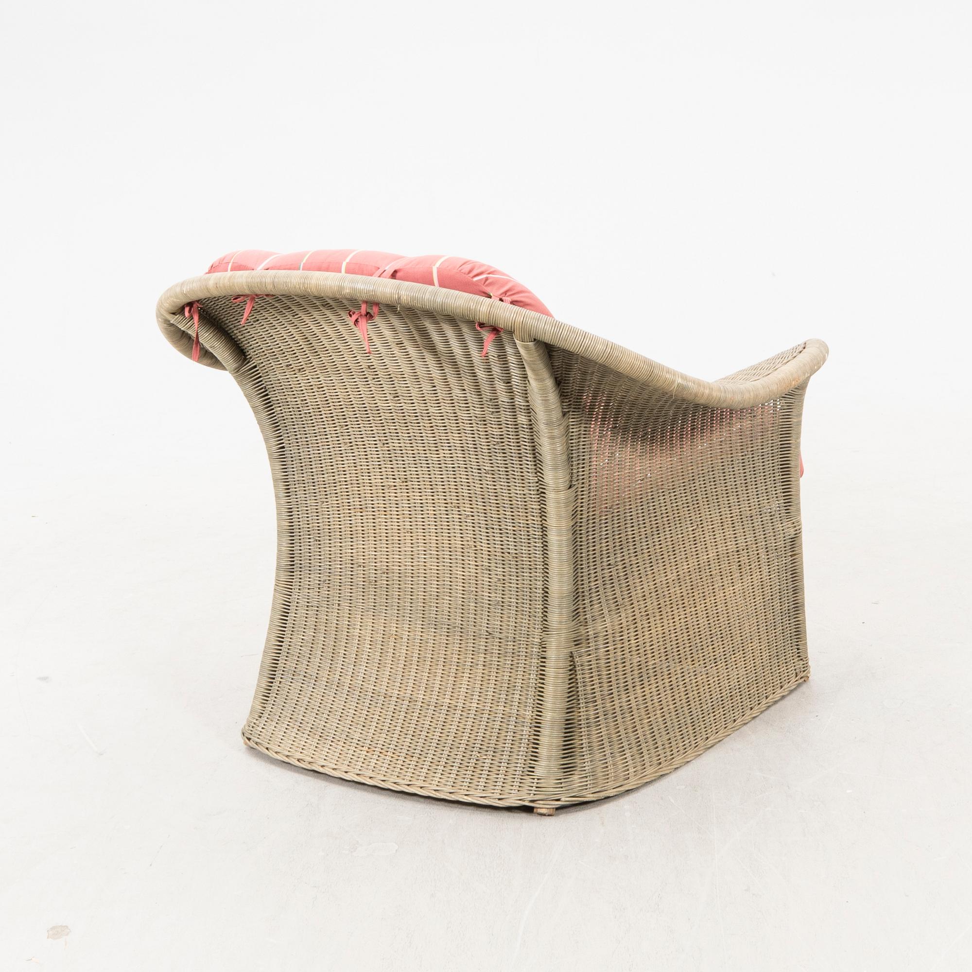 A Bonacina special edition rattan armchair 21st  century.