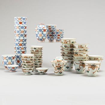 Two sets of 17+12 cups with covers (19+17), Japan, early 20th century.