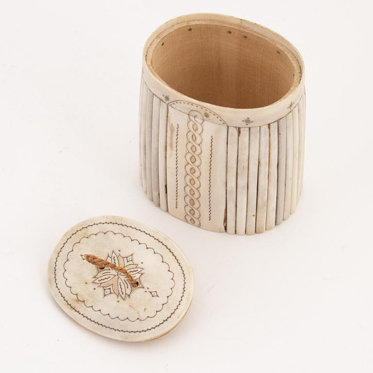 A birch box covered with engraved reindeer horn.