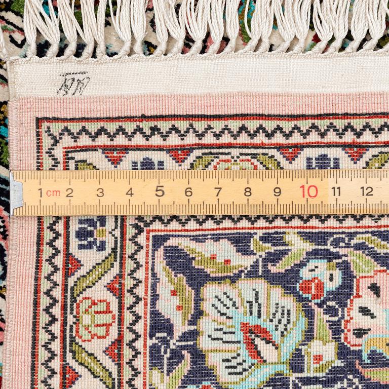 Rug, Hereke design, silk, 122 x 79 cm.