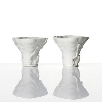 Two blanc de chine rhinoceros libation cups, Qing dynasty, Kangxi (1662-1722).
