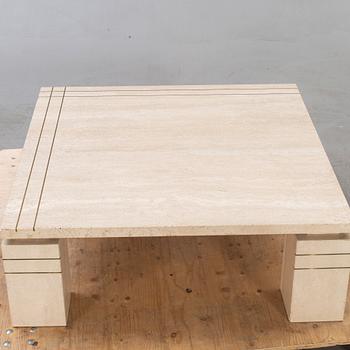A 1970/80s travertin coffee table.
