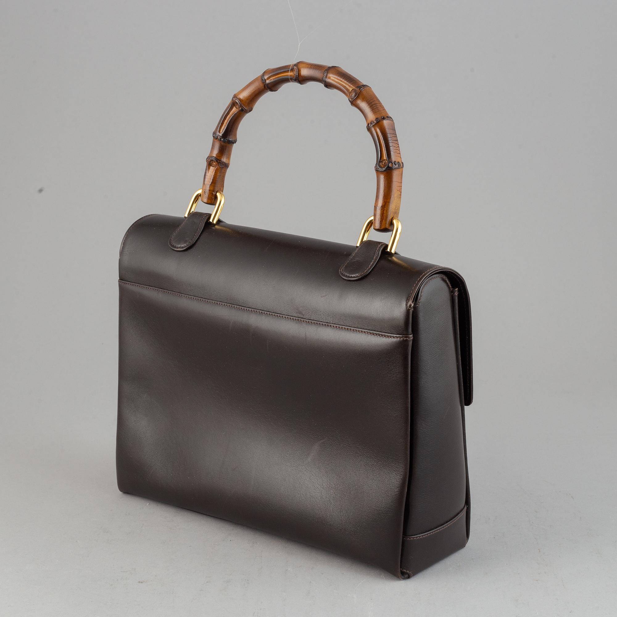 Gucci, a leather and bamboo bag.