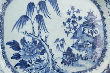 Three porcelain chinese blue and white serving dishes.