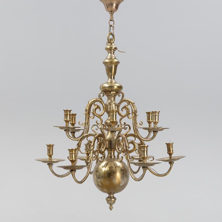A brass Baroque style chandelier, 20th Century.