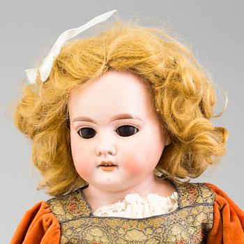 a Armand Marseille porcelaine doll from around 1900.