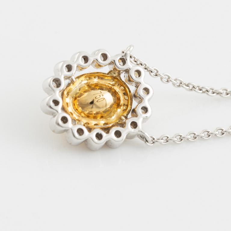 Collier med ovalslipad gul diamant och runda briljantslipade diamanter.
