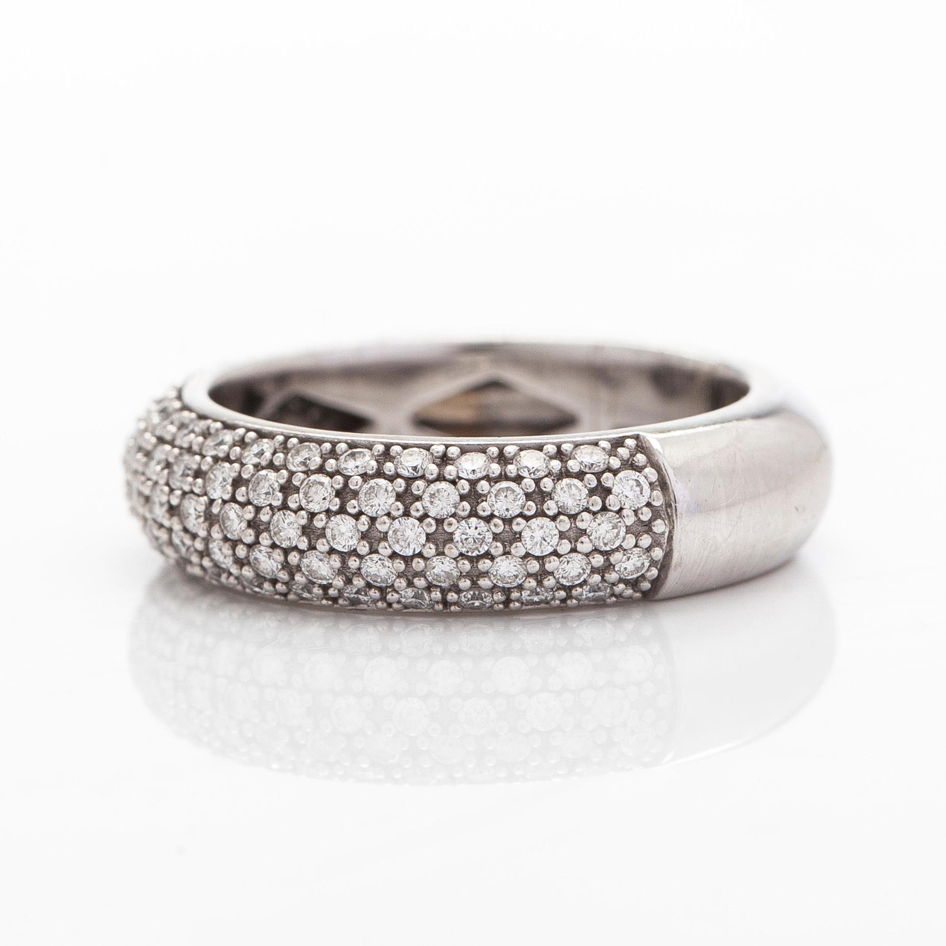 A 14K white gold ring with diamonds.