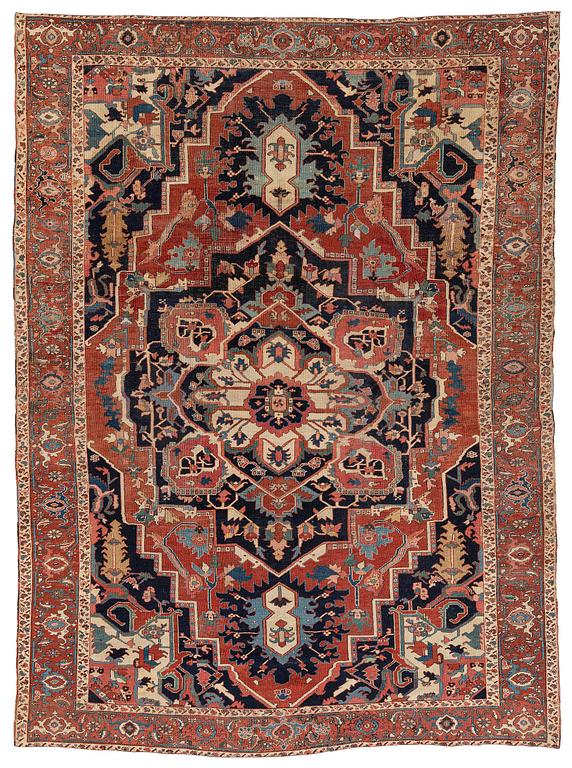 An antique Heriz carpet, Northwest Persia (Iran), c. 397 x 300 cm.