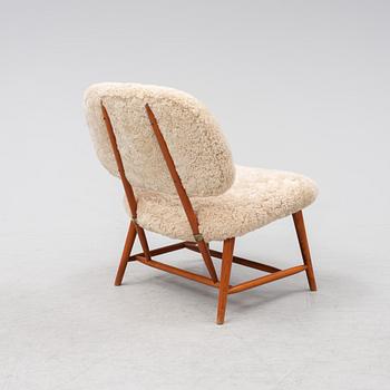 A TeVe easy chair by Alf Svensson, with new sheepskin upholstery, Studio Ljungs Industrier, 1950's.