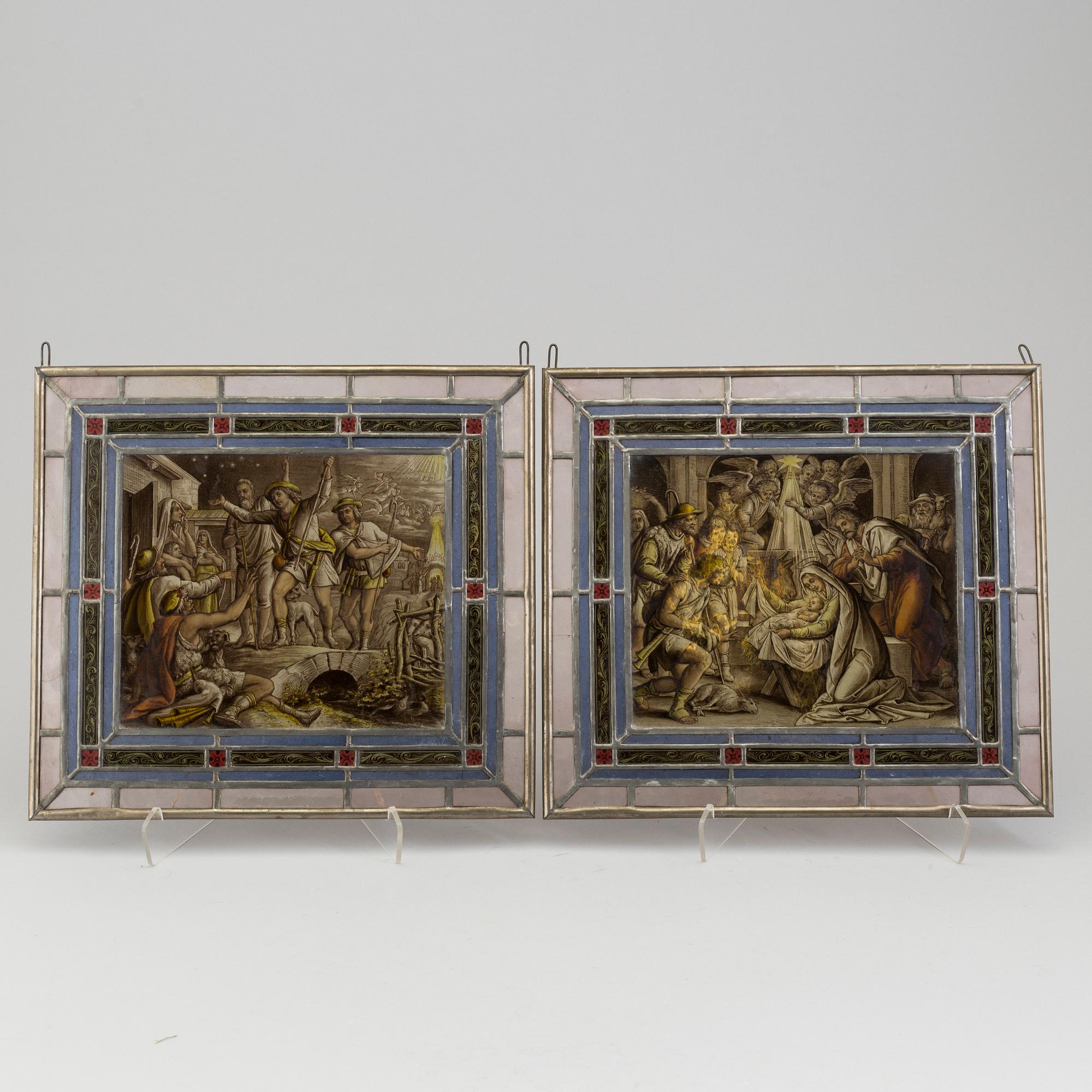 A pair of stained glass windows, circa 1900.