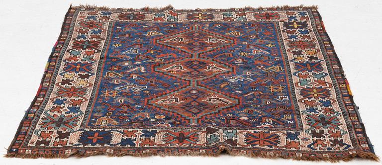 An antique Kamseh rug, c. 150 x 118 cm.