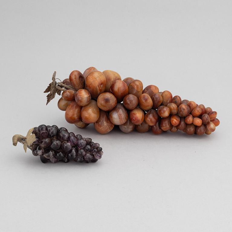 Two agate and quartz grape decorations.