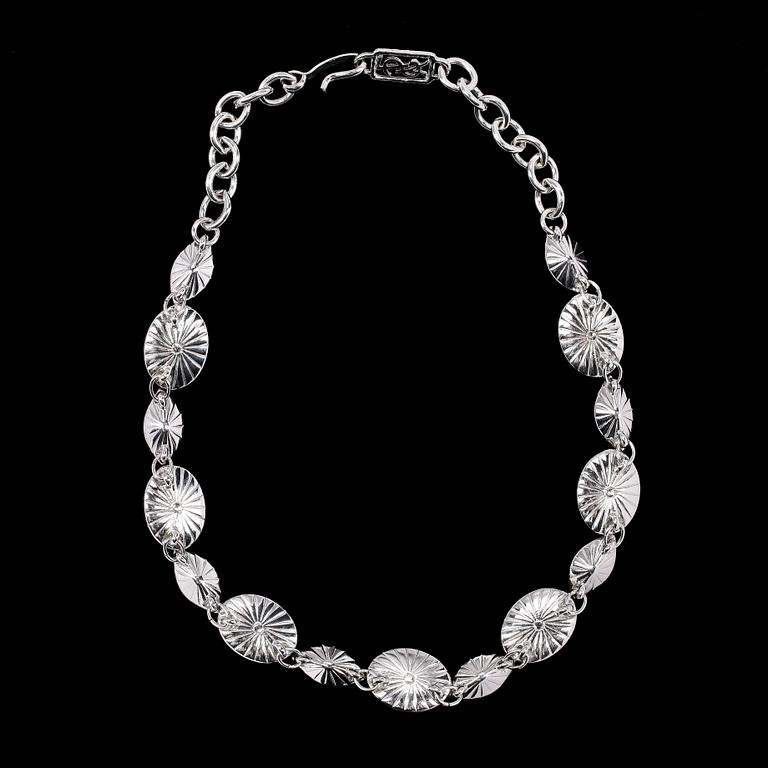 A necklace by Yves Saint Laurent.