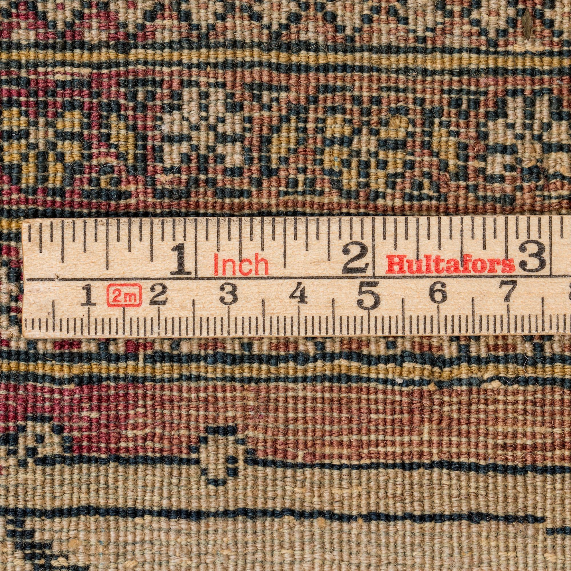 An antique Kerman laver/Esfahan, 214 x 133 cm.