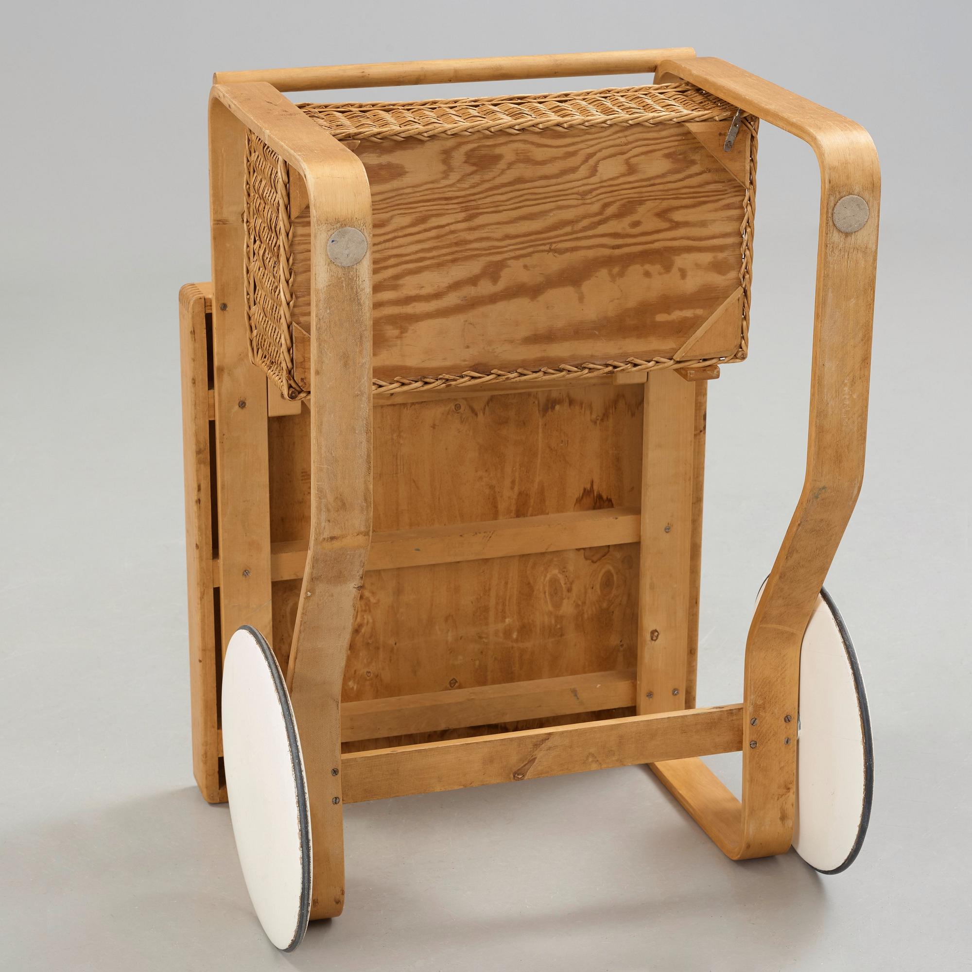 Alvar Aalto, a birch serving trolley made by Aalto Design, Hedemora Sweden 1945-56, on license on behalf of Artek, Finland.