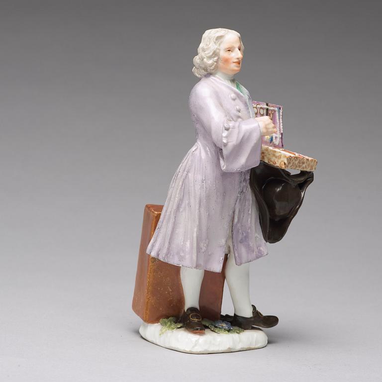 A Meissen porcelain figure of a trinket salesman from the series of Parisian street-traders, circa 1745.