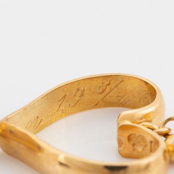 18K gold heart shaped earrings.