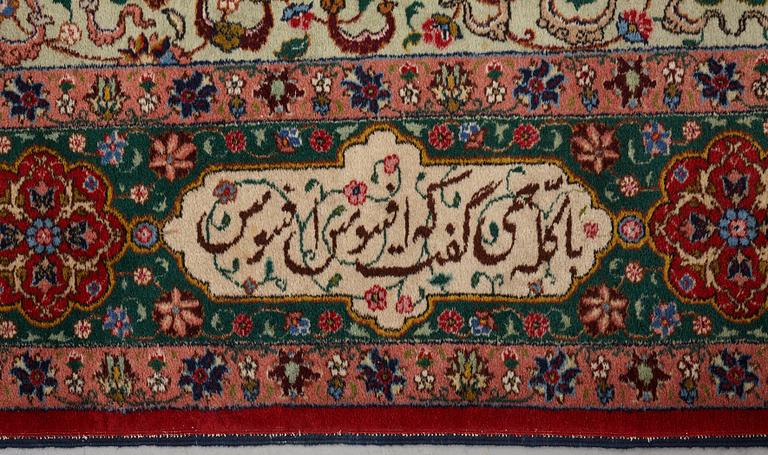 A carpet, semi-antique Tabriz, signed ca 335,5 x 256,5 - 261,5 cm.