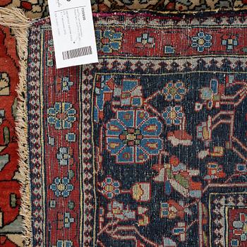 A RUG, a semi-antique Kashan Motachem, ca 217,5 x 134 cm.