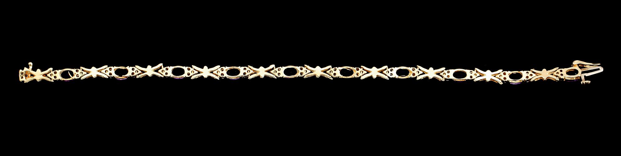 ARMBAND, 14 k guld, diamanter tot ca 0.90 ct, 10 ametister. Total vikt ca 12 g.