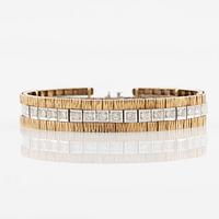 Bracelet in 14K gold and white gold with brilliant-cut diamonds.