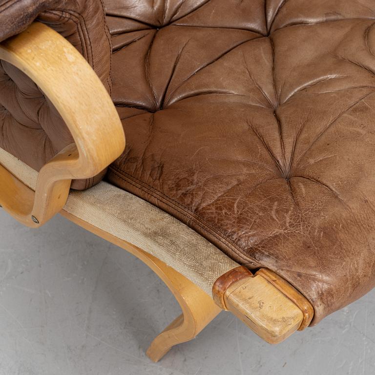 A 'Pernilla' lounge chair by Bruno Mathsson for Dux, end of the 20th Century.