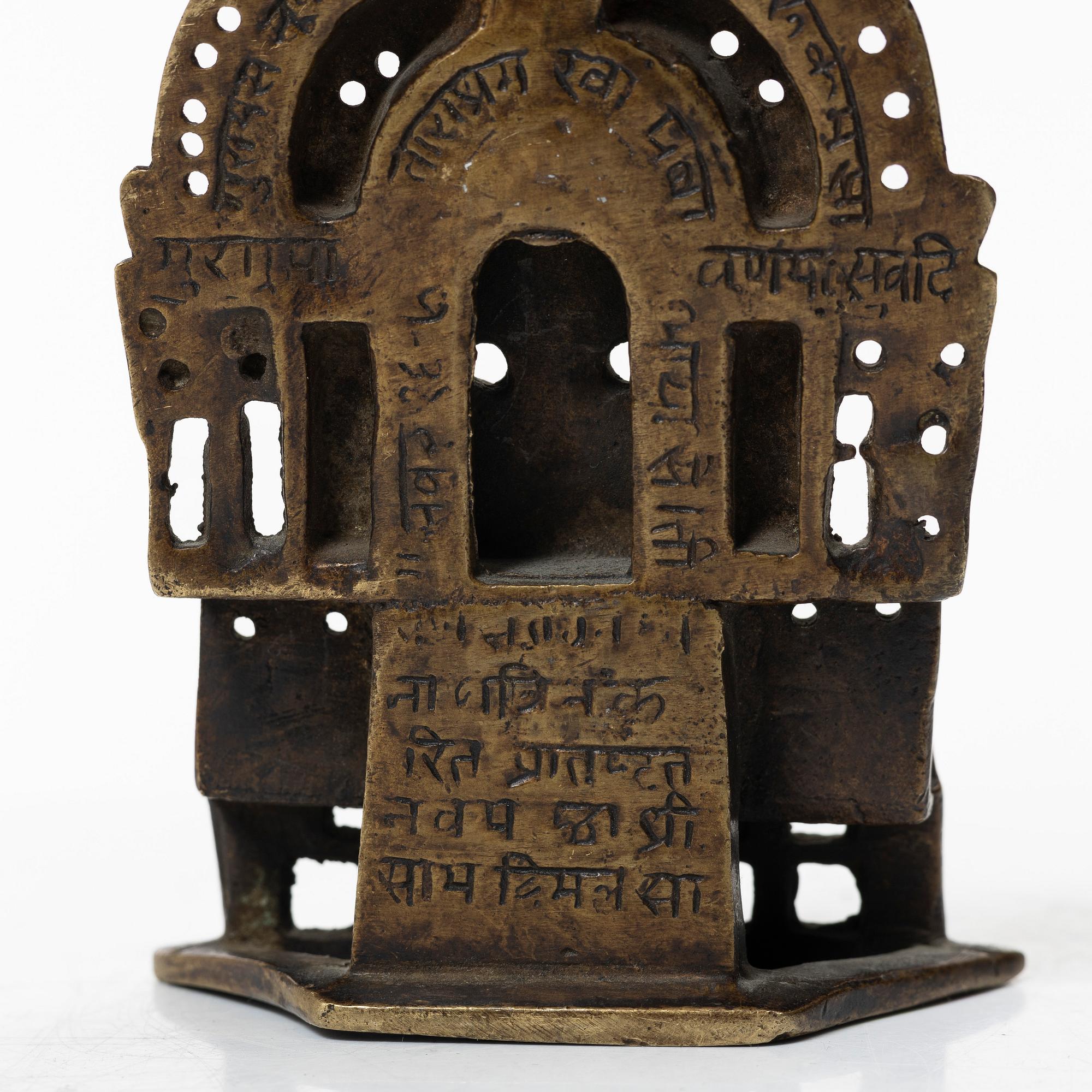 A Jain copper alloy shrine, India, 14th-17th century.