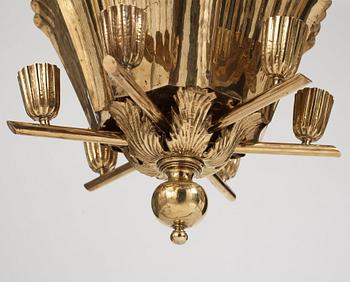 A.W. Borgh, a pair of Swedish Grace brass chandeliers, probably 1920-1930's.
