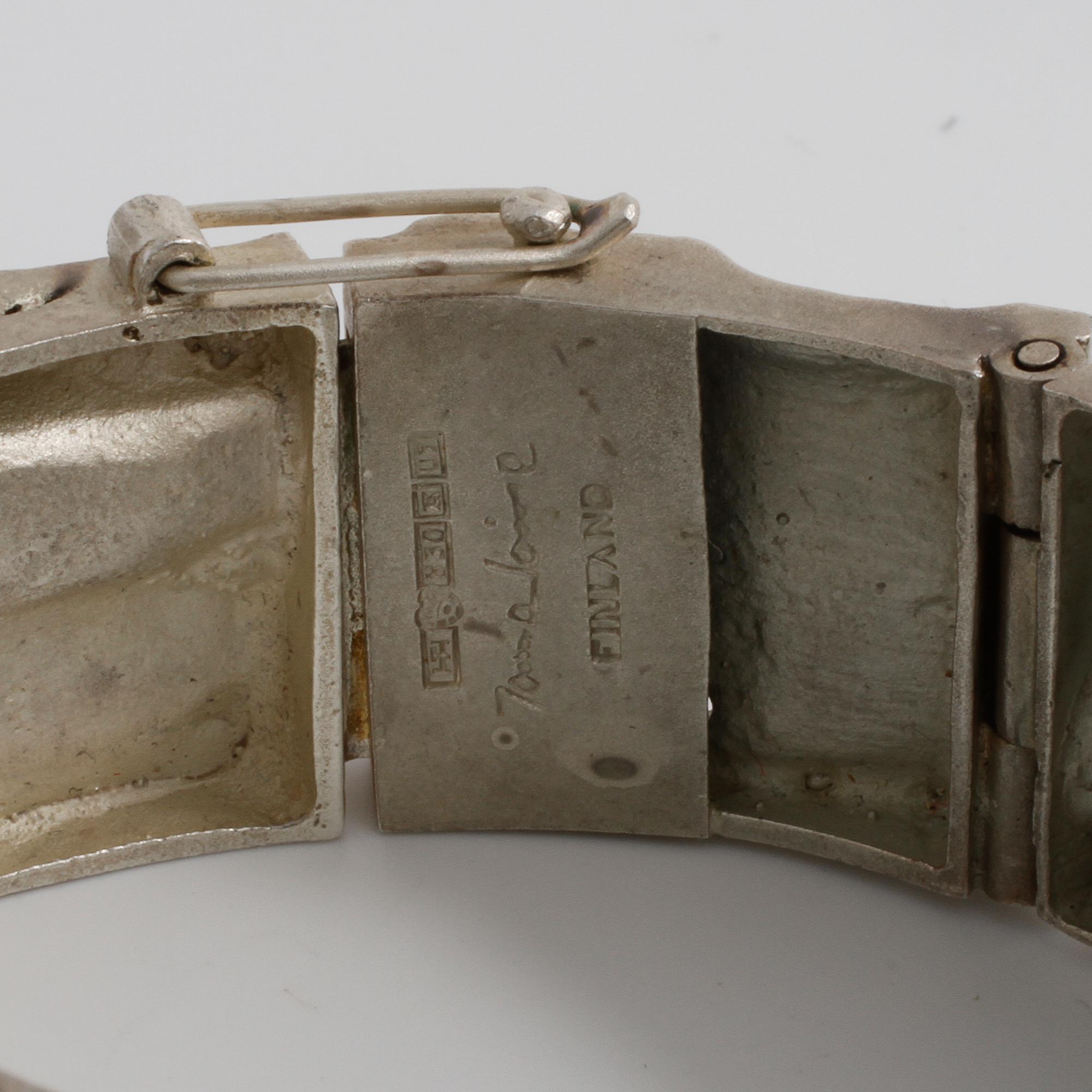 JORMA LAINE, Åbo, 1973, armabnd med fasettslipd bergkristall.