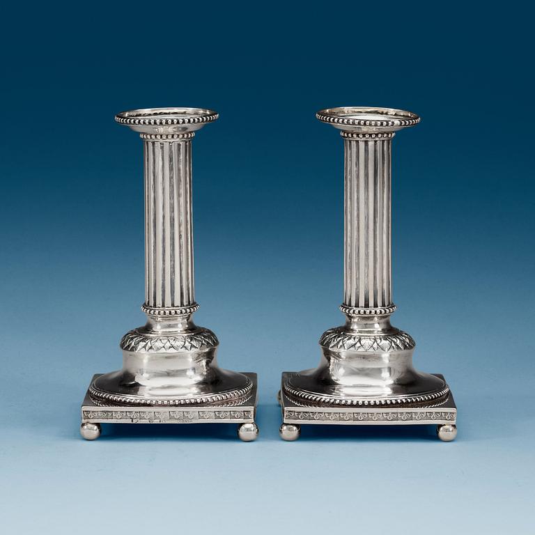 A pair of Swedish 18th century silver candlesticks, makers mark of Anders fredrik Weise, Stockholm 1793.