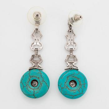 A pair of platinum earrings set with turquoises and old-cut diamonds  with a total weight of ca 1.30 cts.